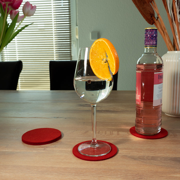 Untersetzer aus Filz / Wollfilz, rund, ø 10cm, 3mm dick, 4 Stück - Filzuntersetzer für Gläser, Flaschen oder kleine Blumentöpfe auf Tisch und Bar